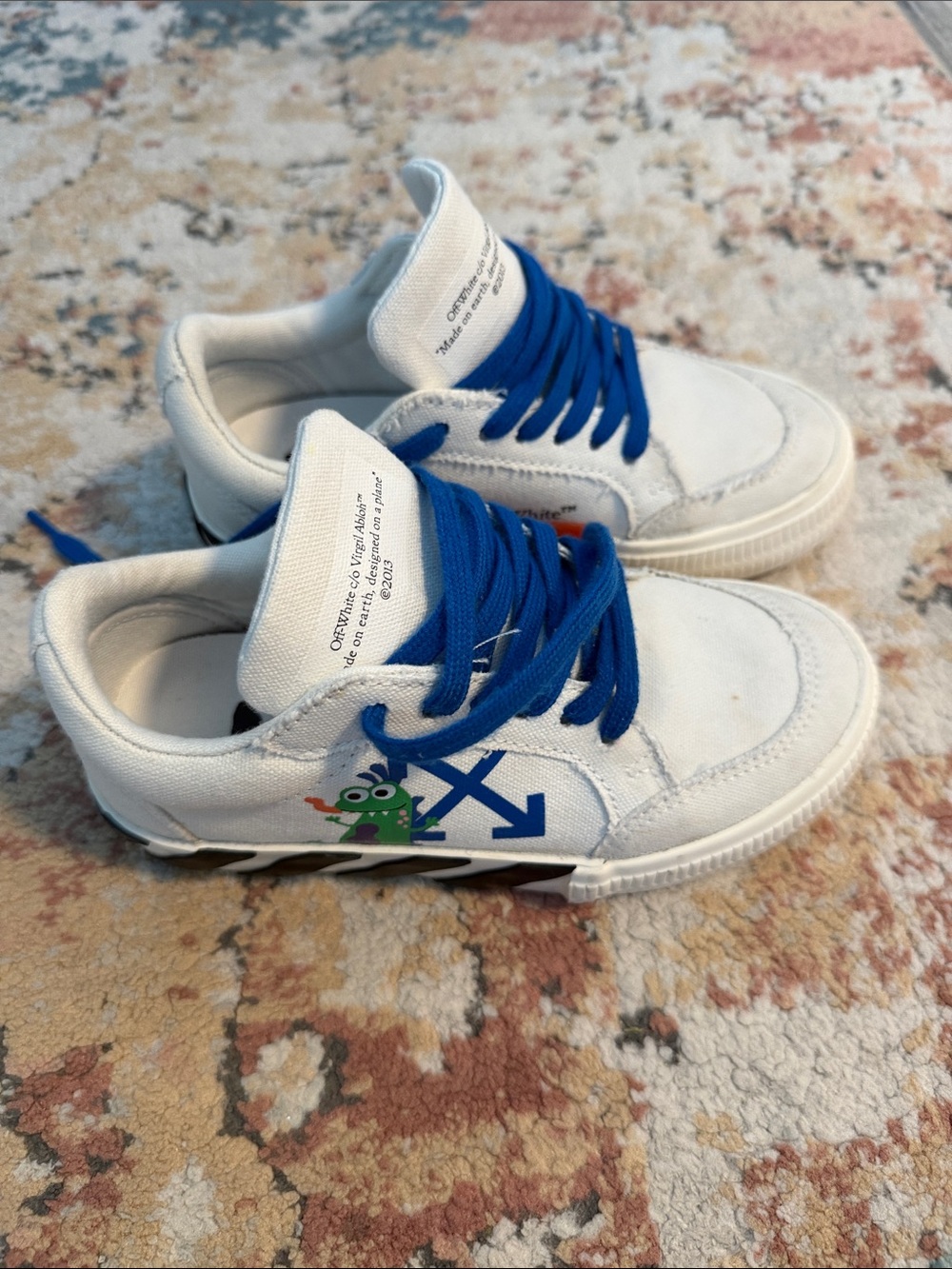 Off-White Kids White Sneakers with Royal Blue Laces and Green Character